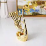 spoon set with swan stand